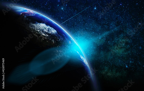 Obraz Dibond Part of earth with sun rise and lens flare over the Milky Way background, Internet Network concept, Elements of this image furnished by NASA