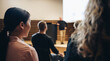 © Jacob Lund - Businesswoman sitting in audience at corporate conference