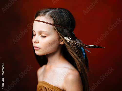 Plakat beautiful girl with headdress feather choker closed eyes side view