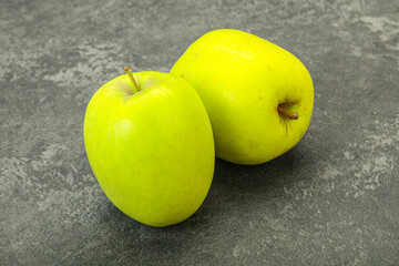 Two ripe green sweet apples