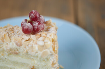 Wall Mural - Delicious of piece cake on plate on wood table