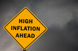 High inflation ahead conceptual road sign against stom clouds