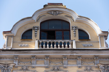 Windows on old city facades, with decorative elements