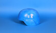 un blue helmet on blue background