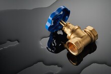 Plumbing Water Ball Valve Is Used To Stop The Supply Of Water Or Gas To The Pipeline On Dark Background
