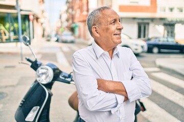 Wall Mural - senior man smiling happy walking at the city.