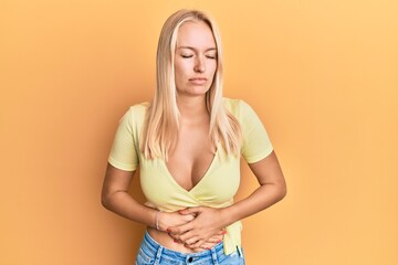 Poster - Young blonde girl wearing casual clothes with hand on stomach because indigestion, painful illness feeling unwell. ache concept.