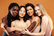 © iordani - young pretty asian, caucasian, afro woman posing cheerful together on brown background, lifestyle diverse nationality people concept