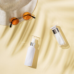 Sticker - Summer flat lay with sunhat, orange color sunglasses, sunscreen cosmetic. Concept of summer hot day on beach.