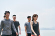 © imtmphoto - group of young asian adults walking outdoors