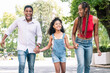 © Mego-studio - Family enjoying a walk together outdoors.