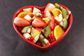 Sticker - delicious juicy fruit salad with strawberries