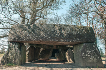 Wall Mural - Massive stone at the entry of the largest dolmen in the world at la roche aux fees in Brittany