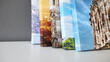 © mikeosphoto - Canvas prints stacked on white surface. Photo printed on canvas