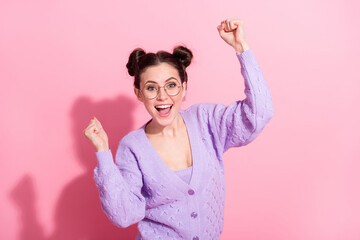 Sticker - Photo portrait of girl smiling overjoyed gesturing lottery winner isolated on pastel pink color background