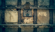 Front Of An Old Shabby Chest With A Padlock And A Blank Sticker