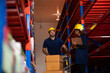 © chokniti - worker person working in warehouse, logistic transportation shipping industry storage, box , pallet shelf, business distribution job working in store, storehouse and good stock factory concept