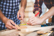 © chokniti - professional carpenters woodworking team work together creatively, creative carpenter working workshop for wooden craftman with wood