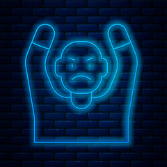 Wall Mural - Glowing neon line Thief surrendering hands up icon isolated on brick wall background. Man surrendering with both hands raised in air. Vector