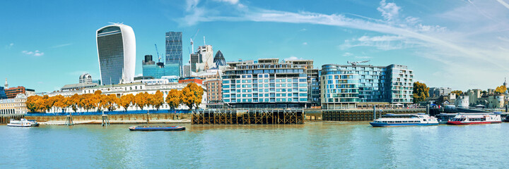Fototapete - Panoramic image of the office block construction on the bank of