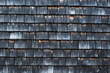 © Sergey Adobe Stock - old wooden wall, old wooden roof, old dark weathered wood shingles