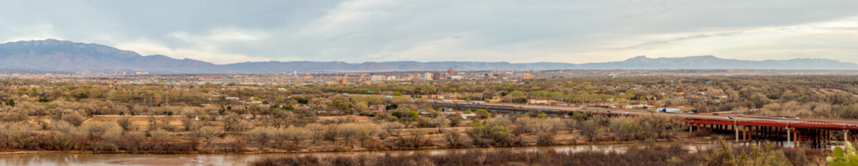 Southwest living. Albuquerque Metro Area Residential Panorama with the view of Sandia Mountains on the distance viewed from the West Bluff Park