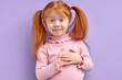 © alfa27 - Nice Redhead Child Girl Holding Hands On Chest, Feeling Gratitude or Dreaming