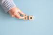 © oatawa - Hand changes wood cube the expression 'IQ' (Intelligence Quotient) to 'EQ' (Emotional Intelligence Quotient).