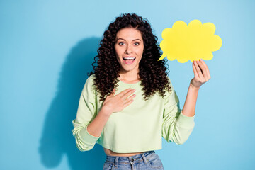 Sticker - Photo of impressed funny person hand on chest hold paper cloud figure isolated on blue color background