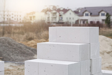 Aerated Concrete on house background. Unfinished house wall made from white aerated autoclaved concrete blocks