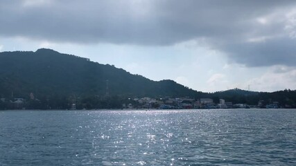 Wall Mural - Slow motion of the island and blue sea