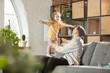 © master1305 - Happy father and little cute daughter at home. Family time, togehterness, parenting and happy childhood concept. Weekend with sincere emotions.