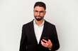© Asier - Young mixed race business man holding a mobile phone man isolated on white background