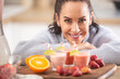 © weyo - Good looking woman enjoying her home made fruit smoothies in the kitchen