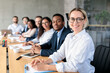 © Prostock-studio - Multiethnic Business People Sitting Having Corporate Meeting In Office