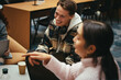 © Jacob Lund - Group of students hanging out in college campus