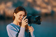 © SHOTPRIME STUDIO - woman tourist with camera in nature Travel professional