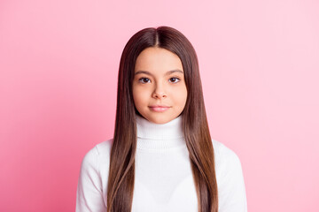 Photo of satisfied school girl kind smile look camera wear white jumper isolated on pastel pink color background