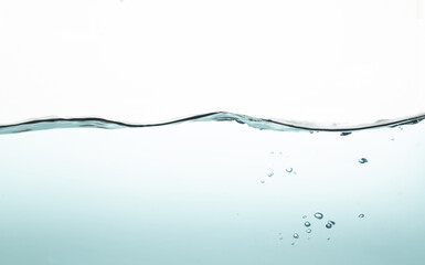 light blue water splash with bubbles of air, isolated on the white background. Giving a clear and clean feeling movement of the waves