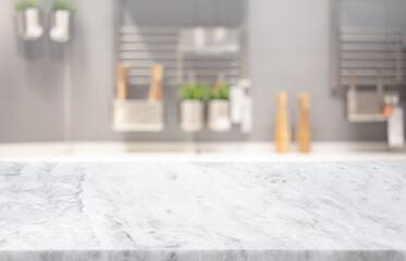 Wall Mural - Selective focus,Marble table top on blur white kitchen room background.F