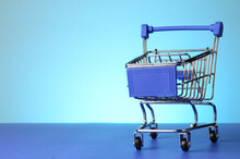 Shopping Cart Over Blue