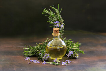 Sticker - Rosemary oil and rosemary herb in glass bottle; Rosmarinus