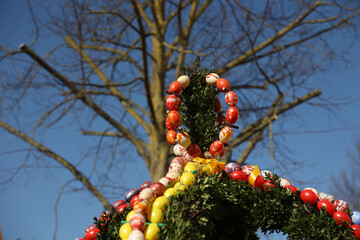 Wall Mural - Beautiful colored decorative eggs used to decorate wells in Germany for Easter