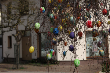 Wall Mural - Colored decorative eggs used to decorate wells in Germany for Easter