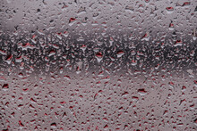 Closeup Shot Of The Water Drops On The Glass Surface
