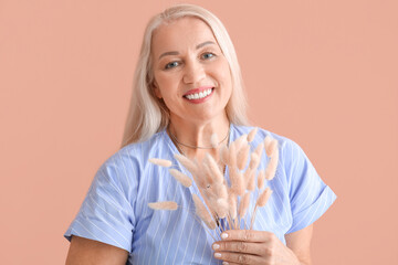 Sticker - Beautiful mature woman with spikelets on color background