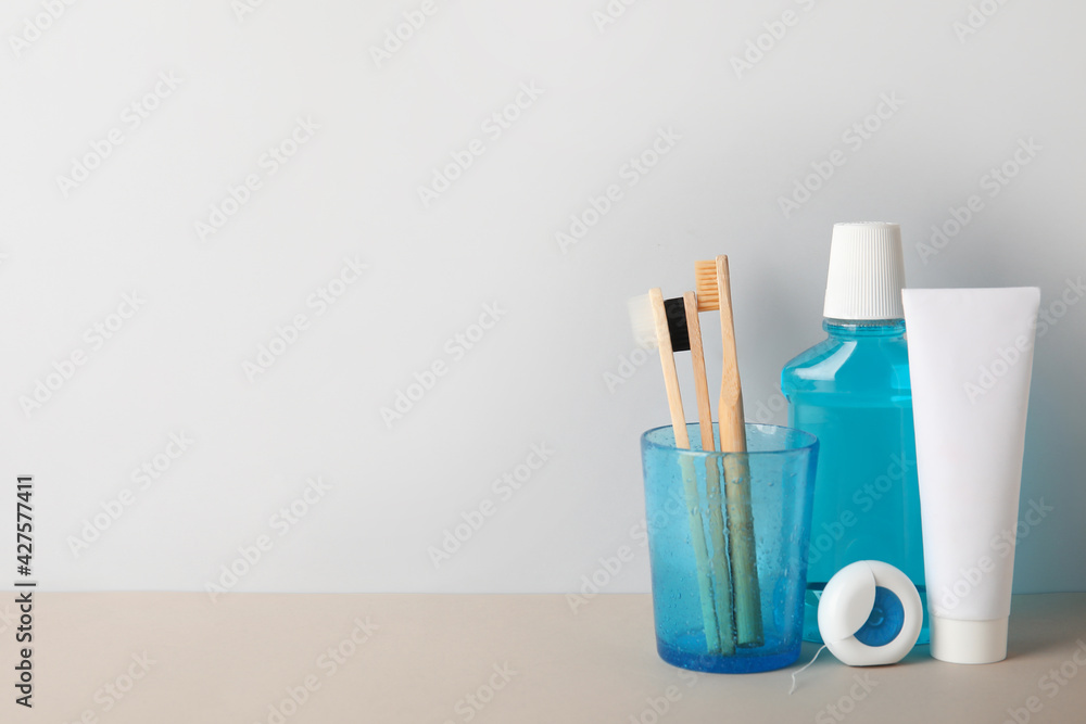Set for oral hygiene on light background