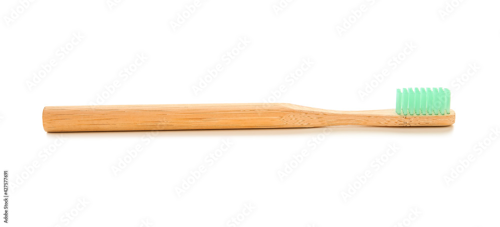 Wooden tooth brush on white background