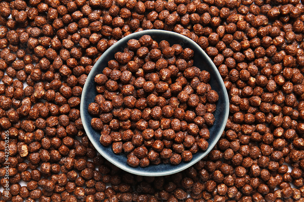 Bowl with chocolate corn balls, closeup