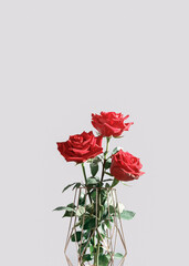 Wall Mural - A bouquet of fresh red roses is in a metal vase. Floral holiday layout. Copy space.